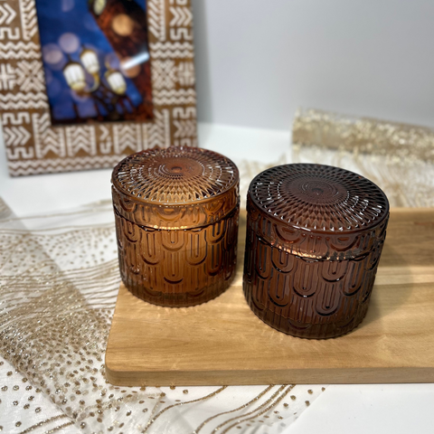 Vela aromática en recipiente de cristal