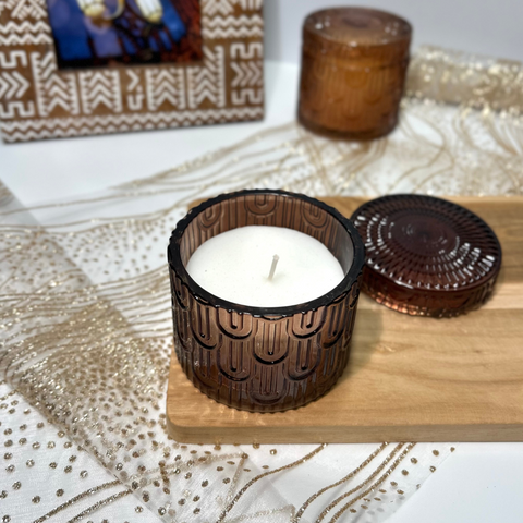 Vela aromática en recipiente de cristal